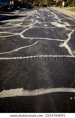 Street prepared for asphalt slurry resurfacing  Royalty-Free Stock Photo #2214764091