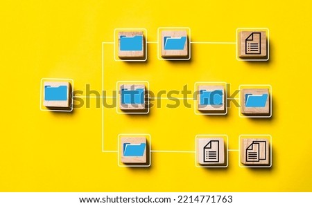 Blue folder and document icon print screen on wooden block cube and flow diagram for document management system concept.