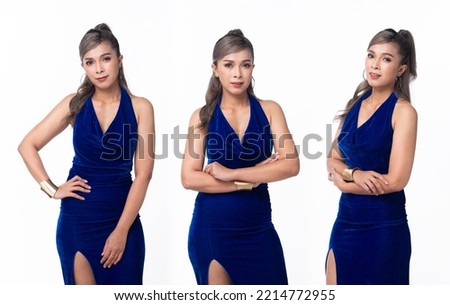 Half body Face Asian 40s 50s Woman wear blue Velvet Evening Gown long ball high heel shoes. Grey Silver Hair Elegance Female stand poses fashion vintage look over white background isolated Royalty-Free Stock Photo #2214772955