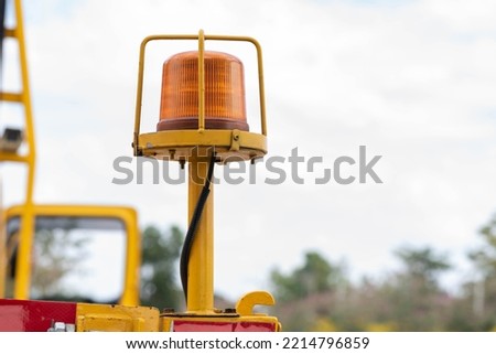 Emergency warning lights, attached to a truck.