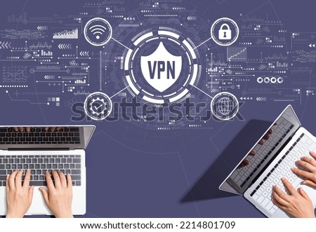 VPN concept with people working together with laptop computers