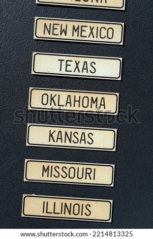 decorative signs naming various states of the USA