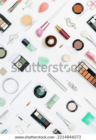 Feminine makeup aqua mente and pink palette accessories with nail polish manicure tools on white background. Flat lay pattern full frame knolling, beauty and cosmetics blogger concept banner Royalty-Free Stock Photo #2214846073