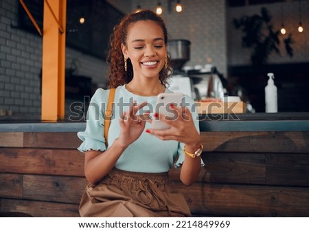 Restaurant, smartphone and relax black woman typing, scroll or check email, contact social media app or social network user. Happy, smile and young gen z girl with mobile tech post to online web blog Royalty-Free Stock Photo #2214849969