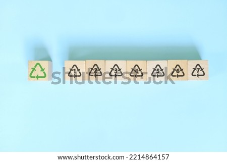 Recycling icon number 1 to 7  icon set symbol on wooden blocks flat lay.