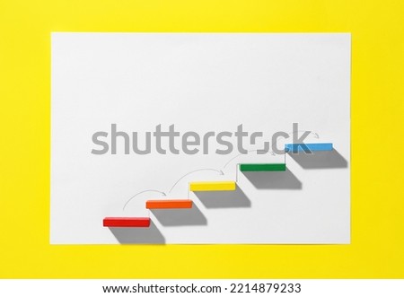 Different color blocks on white and yellow background