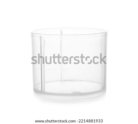 Empty measuring cup on white background Royalty-Free Stock Photo #2214881933