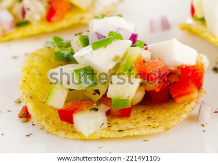 Nachos with vegetables and cheese. Selective focus