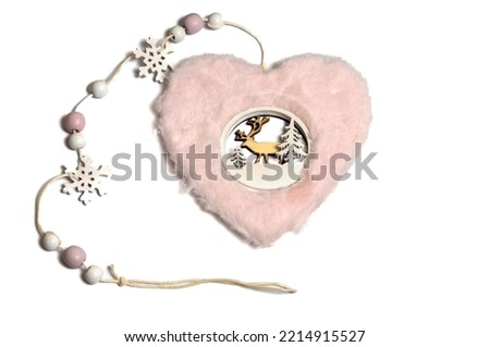 Christmas toy - pink heart in the center of a deer
