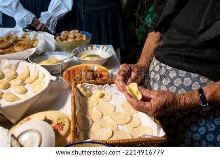 preparation of Sardinian culurgiones. Typical fresh pasta filled with potatoes and mint Royalty-Free Stock Photo #2214916779
