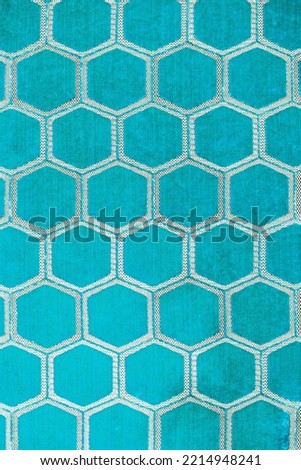 Fragment of velvet febric with hexagon shapes, luxurious textile texture background
