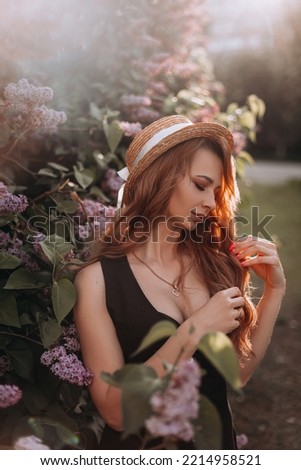 
the charming girl in flowers