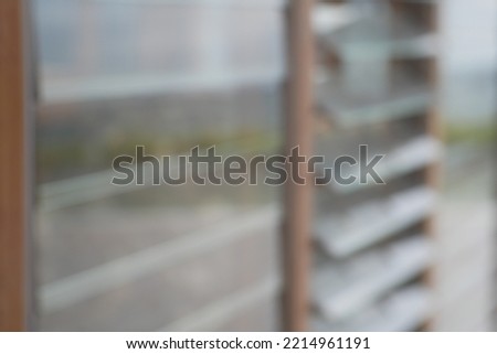 Blur focus of glass windows with blinds.