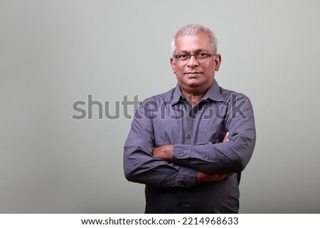 Portrait of a senior man of Indian ethnicity a smiling face Royalty-Free Stock Photo #2214968633