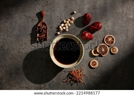 Anise, lotus seed, dried red apple, dried fruit and cordyceps are the ingredients in this nutritious herbal tea.
 Royalty-Free Stock Photo #2214988177