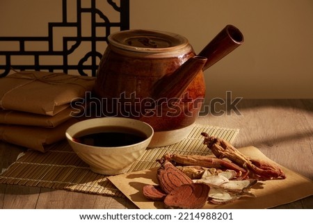 Tabletop herbal medicine vignette with Red Ginseng and finely cut dried mushrooms on the wooden table Royalty-Free Stock Photo #2214988201