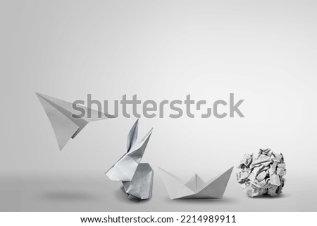 Set of different paper: crumpled, boat, rabbit and plane Royalty-Free Stock Photo #2214989911