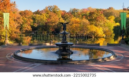 Central Park Bethesda Fountain with The Lake and colorful Autumn foliage. Manhattan, New York City Royalty-Free Stock Photo #2215002735