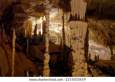 
Flowstone cave Cuevas Drach (Cuevas Coves) at Mallorca Island, Spain, with stalactites at ceiling and stalagmite on the floor on an autumn day. Photo taken 11th October, 2022, Mallorca Island, Spain.