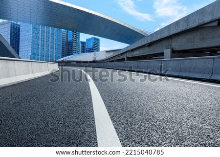 Asphalt highway and city skyline with modern buildings scenery in Beijing, China.