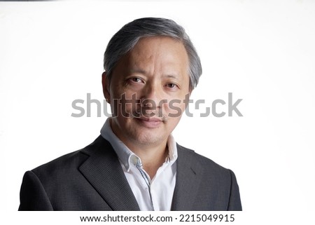 portrait of chinese enthicity  with business wear against white background