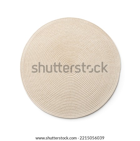 Front view of round braided placemat isolated on white Royalty-Free Stock Photo #2215056039