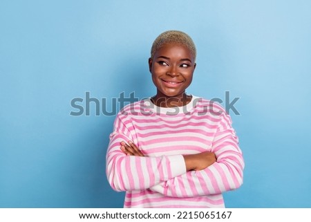 Photo of interesting nice girl wear striped sweater look empty space low prices discount isolated on blue color background