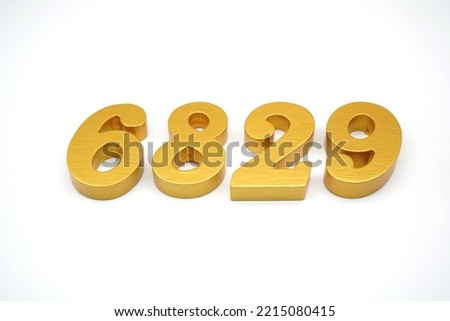   Number 6829 is made of gold-painted teak, 1 centimeter thick, placed on a white background to visualize it in 3D.                               