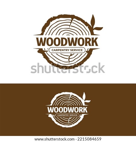 wood work logo with sawed wood Royalty-Free Stock Photo #2215084659