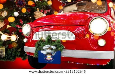 New Year's red car with the flag of State of Utah against the backdrop of a colorful Christmas background