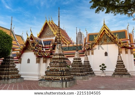 Outdoors of Wat Pho temple showing stupa of royal families in Bangkok Thailand