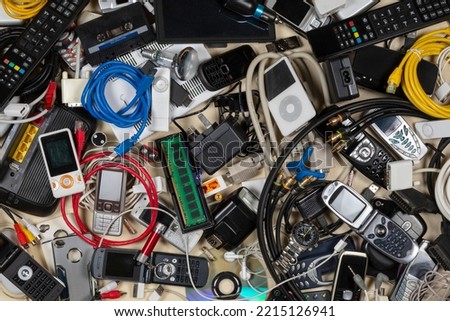 Old out of date technology. Electrical items no longer of any use. Obsolete electrical waste for recycling. Royalty-Free Stock Photo #2215126941