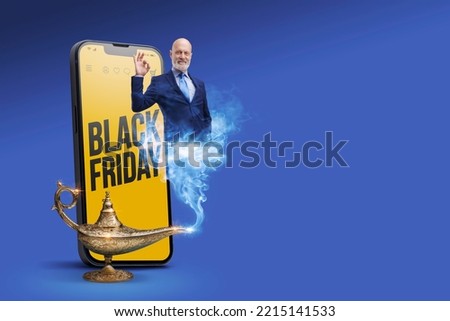Black Friday sale advertisement on smartphone and genie of the lamp making the OK gesture, online shopping and offers concept