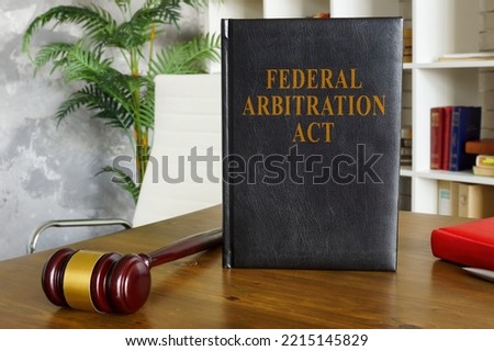 Federal arbitration act on the wooden surface.
