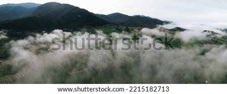 Picture of rice terraces, fog, high angle view Royalty-Free Stock Photo #2215182713