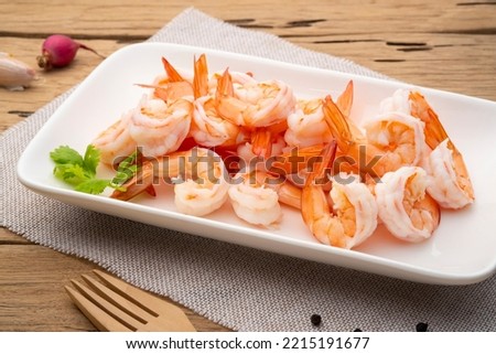 Shrimps, Boiled Prawns in white plate, Shrimp tails ready for cooking,Seafood ingredient Royalty-Free Stock Photo #2215191677