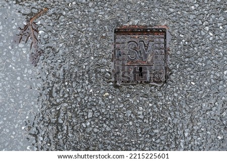 dark gray wet asphalt after rain, wallpaper texture