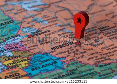 Red pin, point on the map of Moscow. Concept travel background Royalty-Free Stock Photo #2215233113