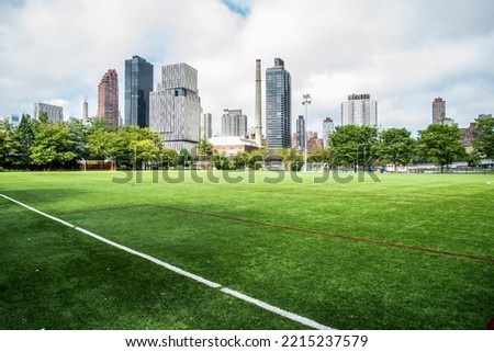 A view of a soccer field in the city 