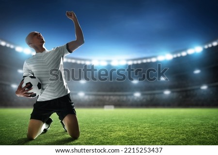 Soccer player celebration in the stadium