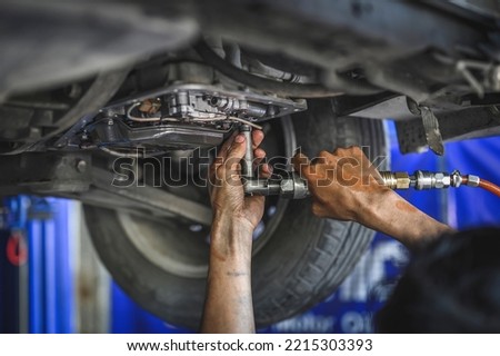Automotive automatic transmission repair and service in garage services. Royalty-Free Stock Photo #2215303393