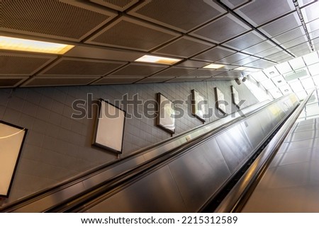 Blank billboard inside subway station