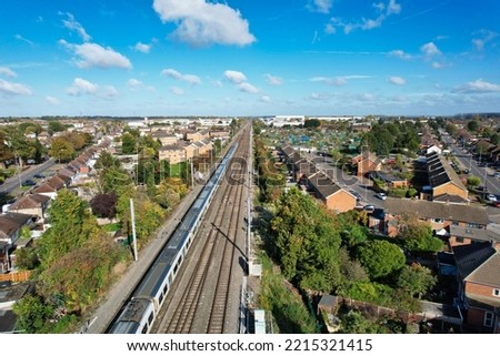 Train on Tracks at Leagrave Station of Luton England, High Angle View with Drone's Camera  Royalty-Free Stock Photo #2215321415