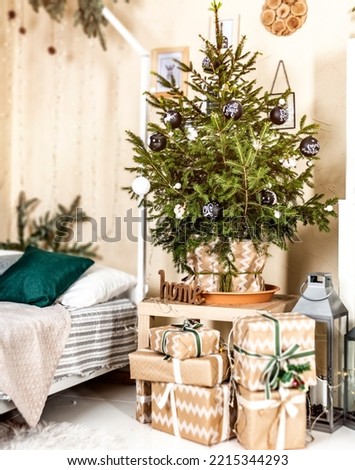 christmas gifts and decorated christmas tree with copy space