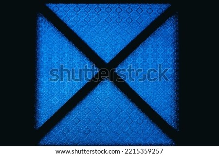 Vintage blue square window glass texture and background, Thai style blue window glass