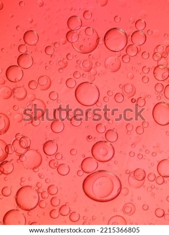 Multi colored bubbles of oil and water
