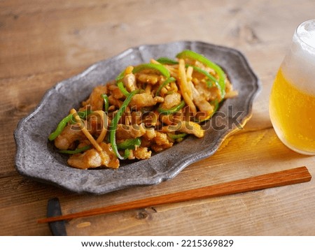 Chinese stir-fry containing green peppers and meat