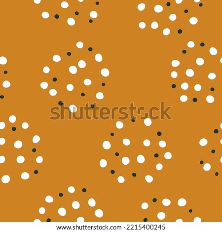 Seamless confetti pattern with scattered rounded spots in an earthy palette. Endless print with colored irregular polka dots in circles. Vector background ideal for textiles, wallpaper, nursery