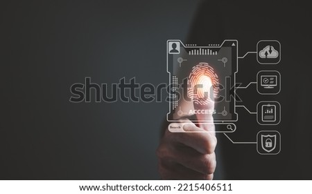 Secure information access, Fingerprint scanning is a security-enhancing technological identity. dependable cloud computing service, privacy protection, big data security, and use the internet safely. Royalty-Free Stock Photo #2215406511