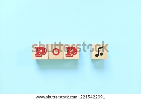 Pop music genre or style concept. Creative flat lay typography composition in blue background.